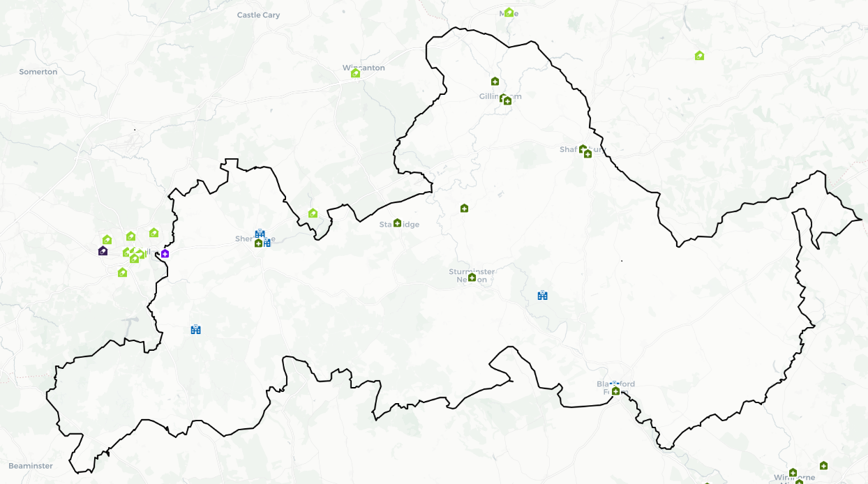 A map showing North Dorset PNA Locality with various icons represent the locations of 100 hour community pharmacies, 40 hour community pharmacies, Dispensing Appliance Contractor, Distance Selling Pharmacies and GP Dispensing Practices which have been defined in the legend table.