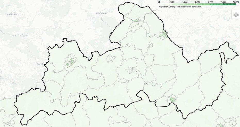 Map showing population density in North Dorset Locality mid-2022, with areas shaded in green. Density ranges from 25 to 13,473 people per square kilometre. Darker green indicates higher population density.